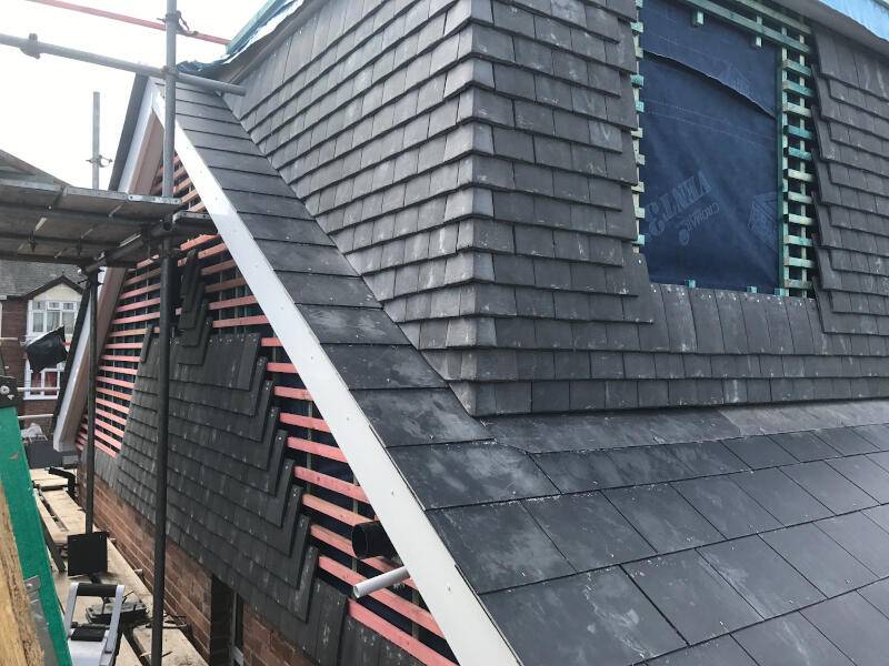Roof with loft conversion extension and roof window