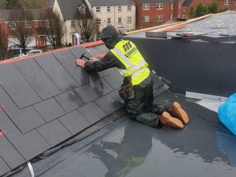 Ludwell valley roofing roofer adding roof tile shingles