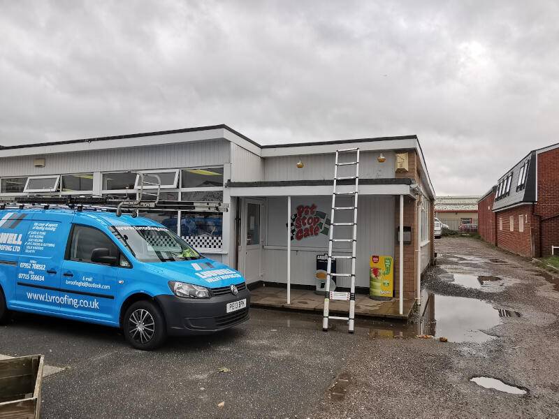 Ludwell Valley Roofing outside cafe with flat roof